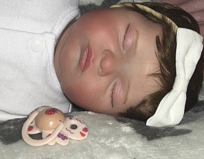 Muñeca reborn niña realista de silicona 50 cm